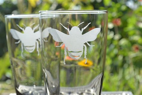 drinking glasses with bee design.